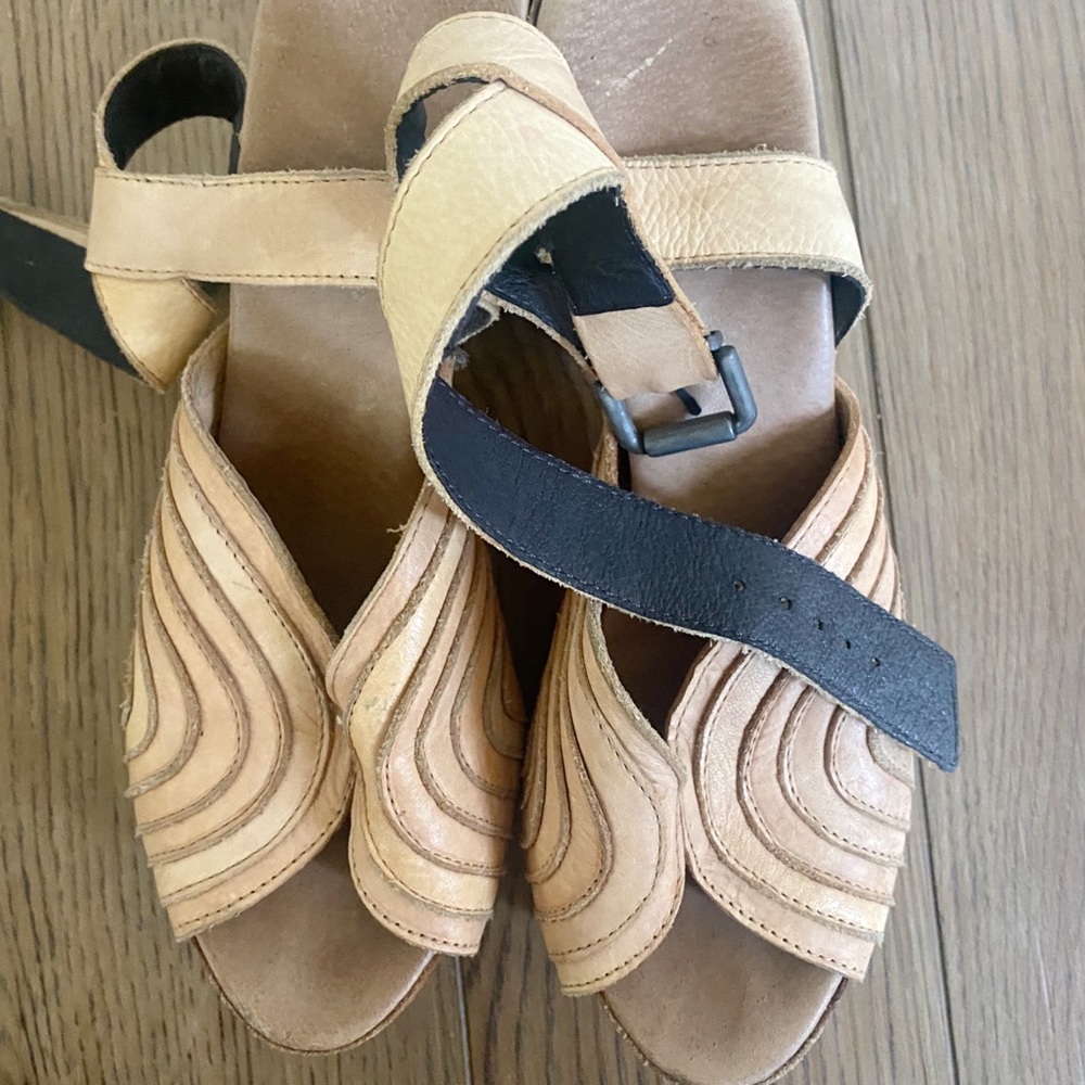 Free People Wood and leather platform heels.